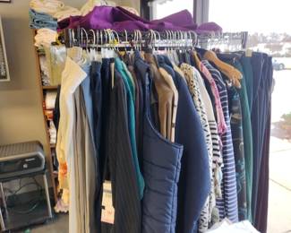 Brand new clothes with tags Women's mainly.