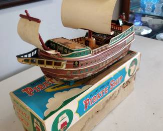 Vintage tin pirate ship toy  with original box awesome piece.
