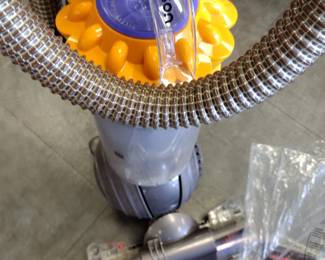 Dyson vacuum with attachments