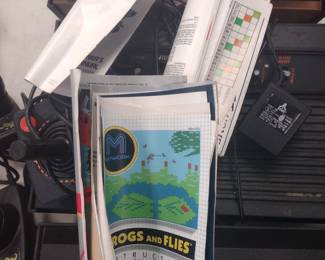 Three Atari game consoles and games