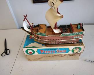 Vintage tin pirate ship toy  with original box awesome piece.