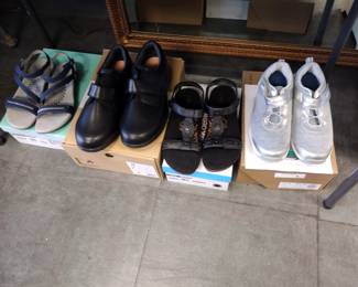 Brand new clothes with tags Women's mainly.