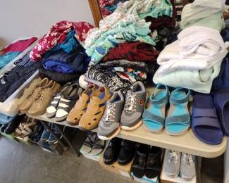 Brand new clothes with tags Women's mainly.