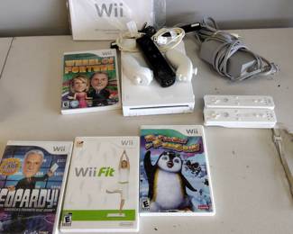 Wii game system with games and remotes
