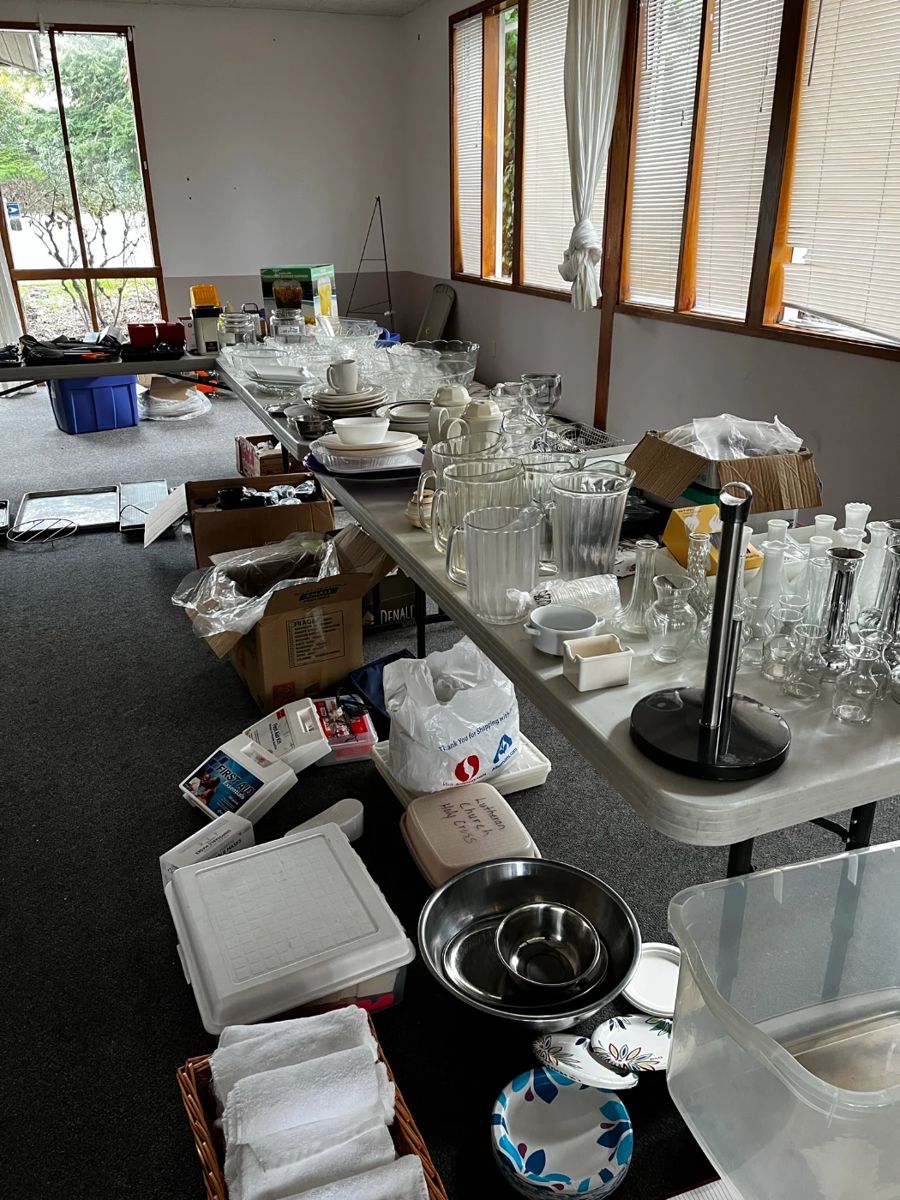 lots of miscellaneous linens, table ware, vases, serving dishes