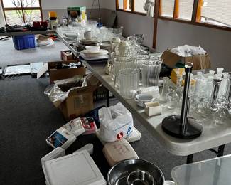lots of miscellaneous linens, table ware, vases, serving dishes