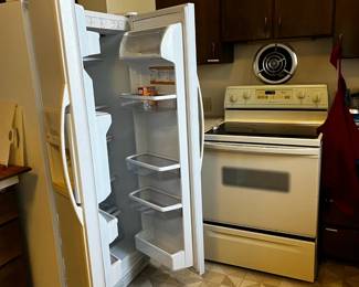 side by side refrigerator and stove