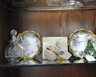 One of many perfume bottles and Limoges hand painted plates