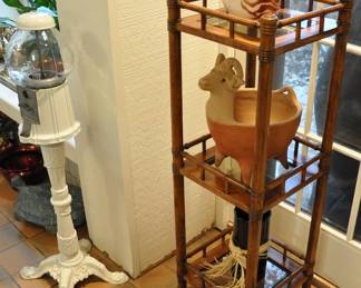 Gumball machine and bamboo style stand with large Fitz and Floyd seashell
