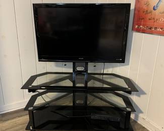Sharp HDMI TV with Stand. Photo 1 of 2.