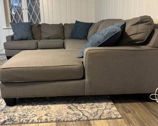 Grey Sectional Sofa with Chaise. Chaise Section Measures 125" W. Other Section is 96" W; Chaise is 65" D. Photo 5 of 5.