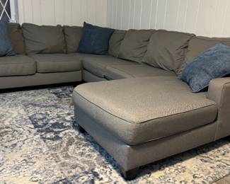 Grey Sectional Sofa with Chaise. Chaise Section Measures 125" W. Other Section is 96" W; Chaise is 65" D. Photo 4 of 5.