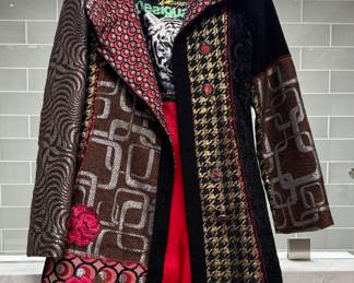 Designer Coat. Size 8 - 10. Photo 1 of 2.