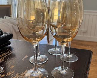 Set of 8 Yellow Stemmed Wine Glasses (5 Shown).