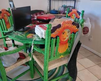 Wooden whimsical patio set table and 4 chairs 150.00 includes protective glass for table