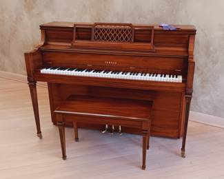 Yamaha upright piano with an incredible tone!