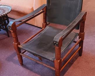 Matched pair of mid-century Danish safari chairs  in black leather...