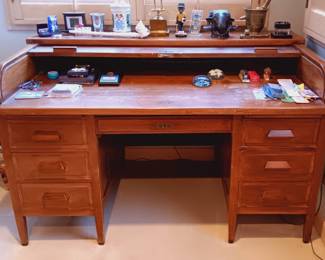 Antique oak roll-top desk (detail)...