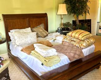 Queen sleigh bed with mattress, linens, blankets 