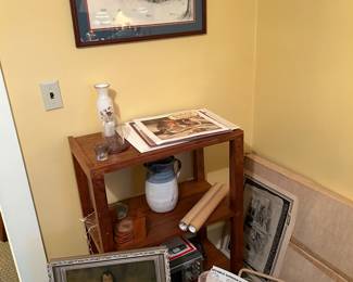Table on casters, prints ,pottery 