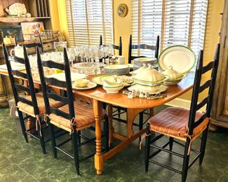 6 black ladder back chairs ,  possible Haywood Wakefield table 
