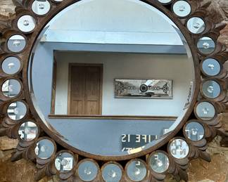 Very interesting round mirror with several mini mirrors on a Metal Stand.  Wow
