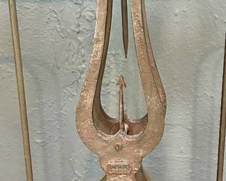 Restoration Hardware "Scales of Justice"   A universal symbol of fairness and equality, our reproduction of a French antique dates to the Second Empire of Napoleon III. Embellished with a lyre-shaped post and peaked bales, our scale is made of cast iron with a rich, textured patina. Its large size indicates that in its former life it was used in a market hall or other commercial enterprise.
DETAILS
* Crafted of iron with an aged, oxidized finish
* Not calibrated for actual weighing of objects
DIMENSIONS
* 32"W x 11"D x 28"H
* Weight: 25 lbs.