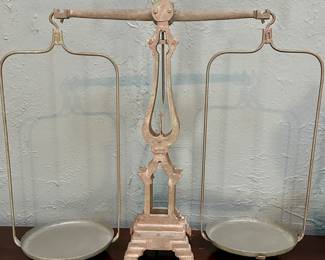 Restoration Hardware "Scales of Justice"   A universal symbol of fairness and equality, our reproduction of a French antique dates to the Second Empire of Napoleon III. Embellished with a lyre-shaped post and peaked bales, our scale is made of cast iron with a rich, textured patina. Its large size indicates that in its former life it was used in a market hall or other commercial enterprise.
DETAILS
* Crafted of iron with an aged, oxidized finish
* Not calibrated for actual weighing of objects
DIMENSIONS
* 32"W x 11"D x 28"H
* Weight: 25 lbs.
