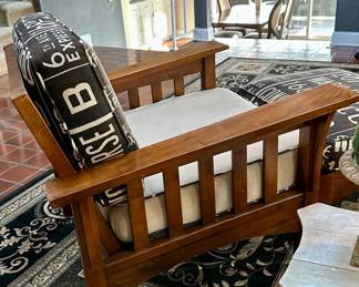Beautiful Mid-Century Mission Style Chair and Ottoman with cool upholstery.

