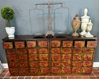 Two Pottery Barn Apothecary Chests with 4 Drawers each and the Rest opens into a Cabinet with Shelves.  Very cool

