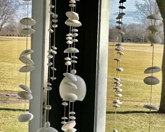 This is a really cool Mobile of different sized stones and porcelain spheres.  