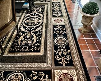Again Gorgeous Rug in Black, Brown, Tan and Gold.
