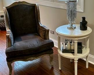 The Table is Restoration Hardware "Baby & Child" Emelia Round Side Table  and Chair is a Antiqued Wood Upholstered Victorian Style.