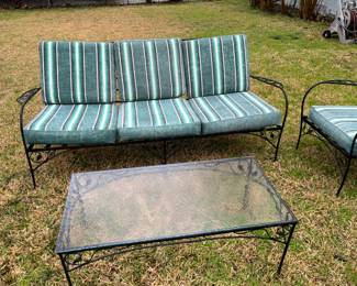 Metal patio furniture. Glass topped tables