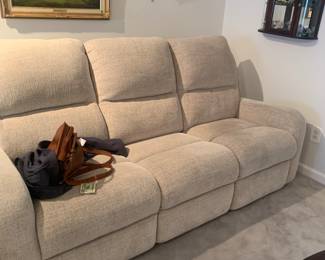 Electric sofa with 2 reclining seats on ends