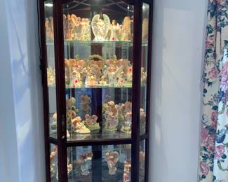 Lighted corner curio cabinet