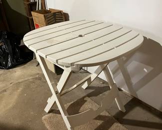 Outdoor umbrella table