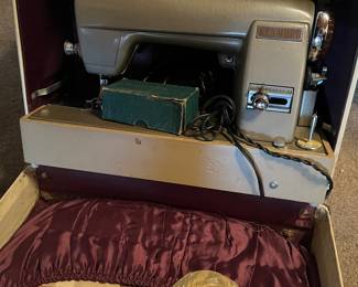 Kenmore sewing machine in case