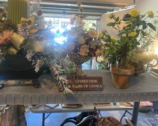 Lots of silk flower arrangements