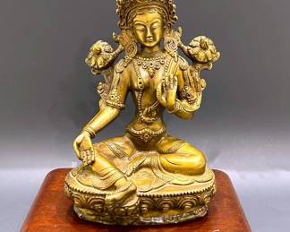 Brass figurine of Tara, female deity in Tibetan Buddhism 