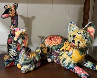 Paper mache giraffes and cat