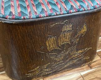Padded storage bench with engraved ship scene