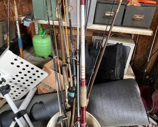 Lots of fishing poles and accessories