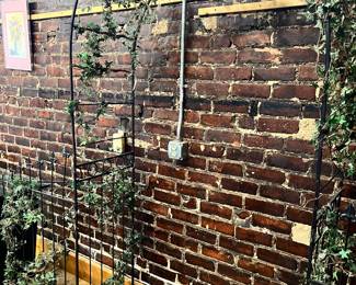 Beautiful arch with artificial ivy