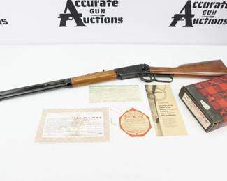 Serial # 65693 The Canadian Centennial commemorative rifles and carbines were released in 1967 with total production at 90,301. This rifle shows all the standard markings and features of the Canadian themed commemorative and was retained by the factory as a production example for their collection. This Rifle has its sister gun at Lot 18008. This Rifle Comes with the original box and is in Excellent Condition showing normal signs of use and wear.