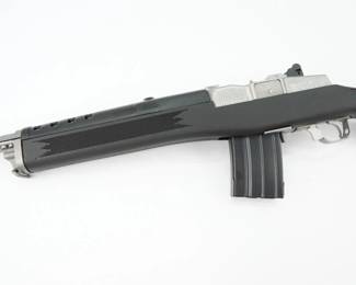 Serial # 582-31902 Condition: Excellent The Ruger Mini-14 Tactical Stainless rifle offers inherent accuracy and quick repeat shot capability. Its Garand-style action with breechbolt locking system, is a fixed-piston gas system and self-cleaning which gives unparalleled reliability under harsh operating conditions. The steel receiver is drilled and tapped, has a Picatinny rail, and integral scope mounts that provides a stable mounting surface. The Mini-14 Tactical also has a cold hammer-forged, threaded barrel and ghost ring adjustable rear and blade front sights. This Rifle comes with the original box and is in excellent condition showing normal signs of use and wear. 