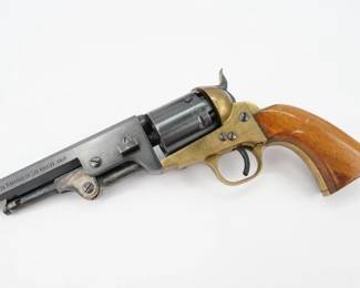 A black powder cap and ball revolver chambered in .36 caliber features a 5 inch barrel This pistol is in excellent condition showing normal signs of use and Wear.