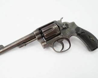 In 1899, the United States Army and Navy placed orders with Smith & Wesson for two to three thousand Model 1899 Hand Ejector revolvers chambered for the M1892 .38 Long Colt U.S. Service Cartridge. With this order, the Hand Ejector Model became known as the .38 Military and Police model. This Revolver Shows its age and is in Good shootable condition. 