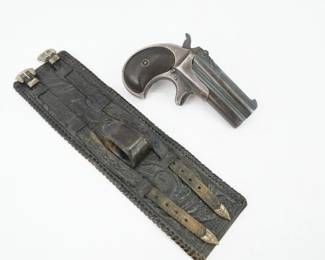 Remington Arms, double derringer, This firearm was made after UMC purchase of Remington, 1910. The serial number is L94400. It was manufactured after 1911 before 1922, as it does not have a Letter date code on the barrel. The guns appear to be in 41 rimfire. It comes with a leather holster, that looks to be an ankle or wrist holster , it is marked sdmyres, el Paso.