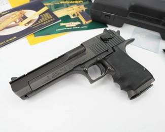Serial # 36200781 Condition: Excellent The Desert Eagle is a gas-operated, semi-automatic pistol with a 7 round capacity in .50 AE. This is an early model dated back to 1995 stamped IWI and comes with all the paperwork and original box . This Pistol is In New Condition showing very little signs of use.